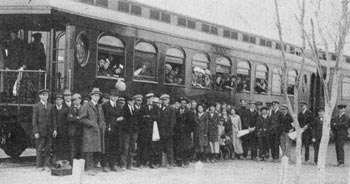 Group in front of train